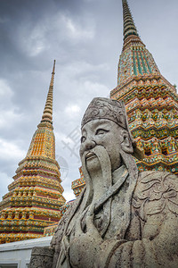 泰国曼谷卧佛寺的守卫雕像泰国曼谷卧佛寺的守卫雕像图片