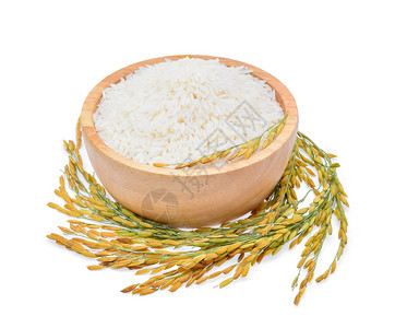 白底木碗中的水稻白底黑茉米饭谷物图片