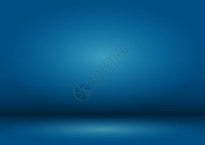空白蓝工作室背景与vignet蓝色背景由光源照亮图片