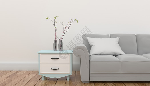 灰色沙发上装有植物和枕头的柜子在白色空面壁前图片