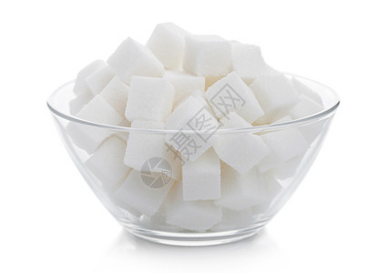 白色上天然糖的玻璃碗图片