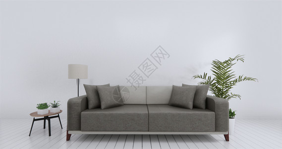 灰色沙发以及几盆绿植图片