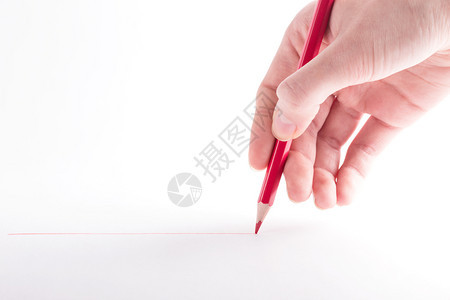 白色背景上的红铅笔图片