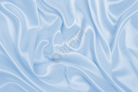 优雅的蓝色丝绸或席子奢侈布质可用作抽象背景图片