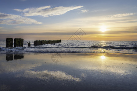 圈子石勒苏益格锡尔特岛日落北海水锡尔特岛海滩北黄昏地貌海平面背景