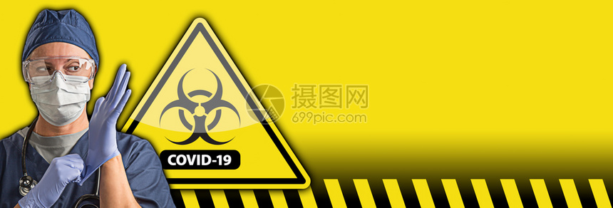 身着防护设备和cornacvid19的医生或护士身着保设备后有生物危险警告标志图片
