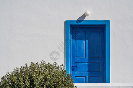 在圣塔里尼小岛上的家庭墙和门抽象图片
