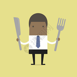带叉子和刀的非洲商人图片