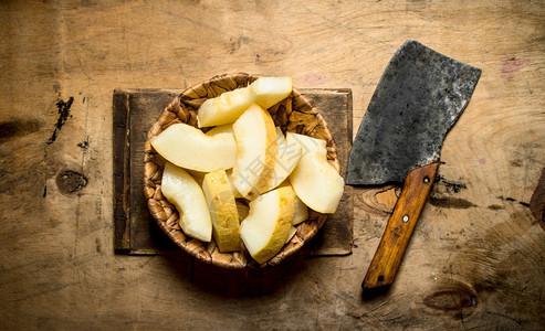 用切成的熟瓜片用斧子切成的熟瓜片用斧子切成的熟瓜片图片