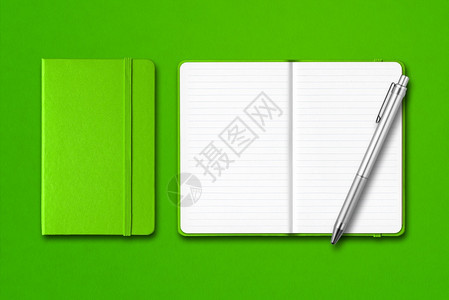 绿闭和开线笔记本用钢隔绝在多彩背景上绿闭和开笔用隔绝在多彩背景上图片