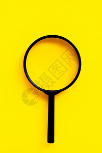压音背景上的放大镜顶部视图图片素材