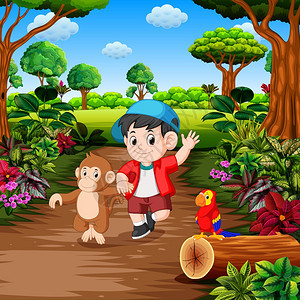 一个男孩与猴子在雨林中图片