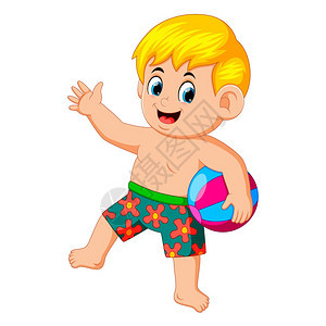带沙滩球的小男孩享受他的假期图片
