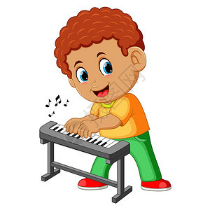 快乐的小男孩弹钢琴图片