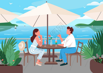 一对夫妇情侣在海边餐厅喝饮料图片