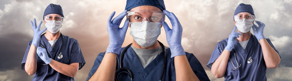 一群医生或护士身着个人防装备图片