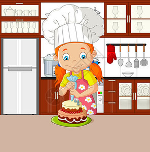 带围裙装饰蛋糕的厨女师图片