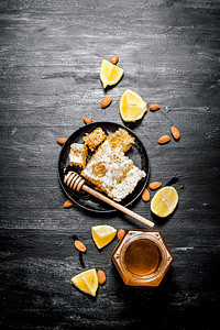 蜂蜜背景甜的天然蜂蜜柠檬黑色生锈背景图片