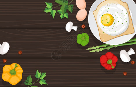烹饪木制餐桌的鸡蛋面包蔬菜图片