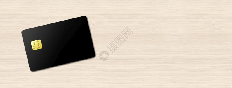 木制背景横幅上的黑信用卡模板3D插图木制背景上的黑信用卡图片