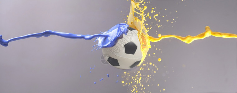 黄色和蓝涂料喷洒的足球图片