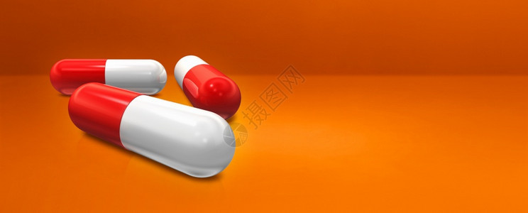 橙子工作室横幅上孤立的胶片药丸3D插图橙子工作室横幅上的胶片药丸图片