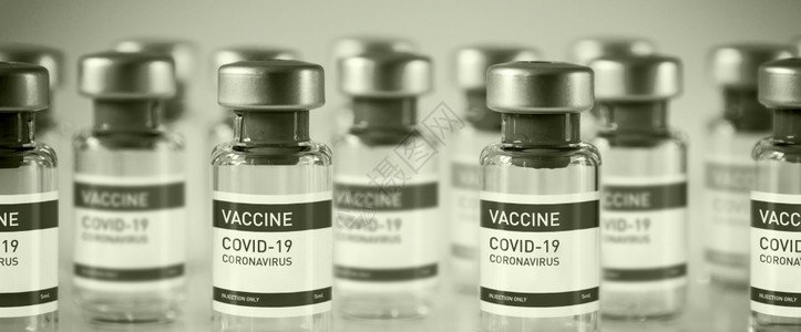 黑色和白实验室背景的19个疫苗瓶横向幅黑色和白背景的19个疫苗瓶图片