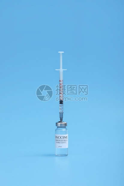 实验室医院或药房的液体疫苗蓝底的液体疫苗图片