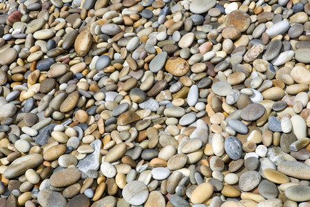 彩色的石头背景在海滩上图片
