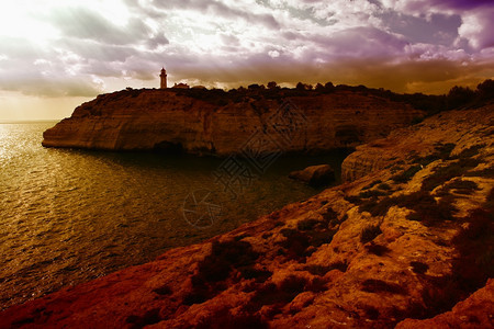 位于Portugal以南Arve海岸的灯塔图片