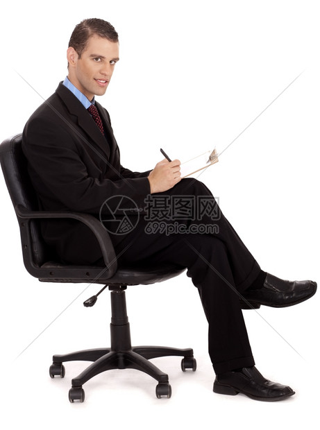 职业商男子在白色背景下坐轮椅上作笔记图片