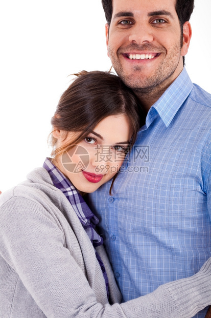 孤立背景的拥抱女年轻男子近视图片