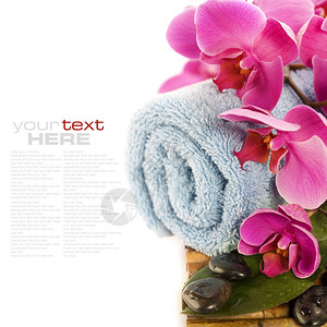 白色和带样本文字的SME概念制石块毛巾和兰花图片