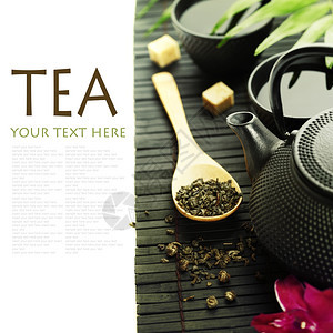 竹垫绿色茶叶兰花和筷子上装有样本文的亚洲茶叶图片