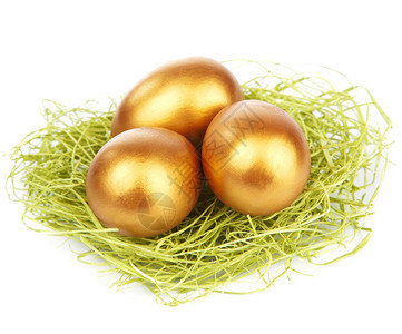 孤立的巢状金色东蛋图片