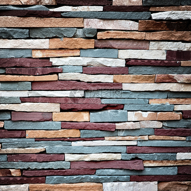 彩色石头墙纹理摘要背景