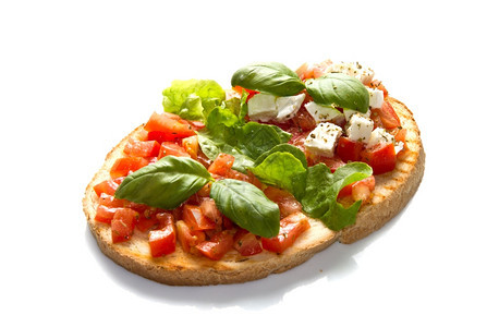 意大利布鲁夏塔配有新鲜西红柿面包大蒜橄榄油和奶酪图片