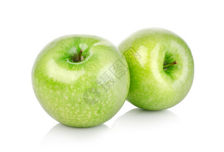 两个绿色苹果在白背景上被孤立图片