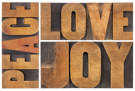 和平爱喜乐打字抽象以印刷木制形式的单词拼图片