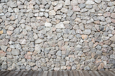 用作背景材料的石砖墙图片