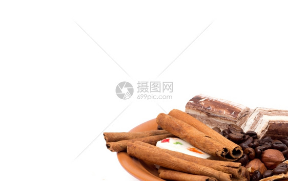 甜食肉桂坚果和咖啡豆图片