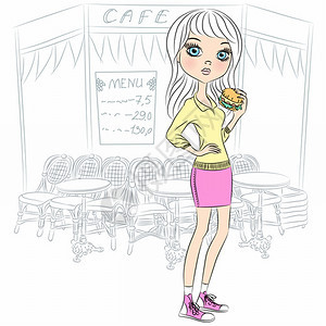 美丽的时装女郎在巴黎咖啡厅旁图片