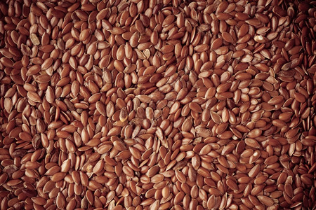 棕色原麻叶种子作为天然食物背景图片