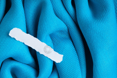 粗版纸面的废碎片关于纺织品质料设计优雅材的蓝色背景布面卷式纺织质料设计图片