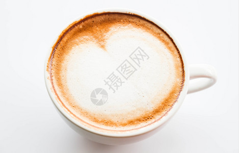 俯视图咖啡拿铁上的泡沫心脏形状图片