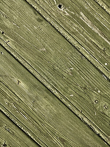天然木板或老旧纹理的厚绿色背景图片