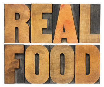 健康的生活方式概念真实食物用古老的印刷品木头型单行文字图片