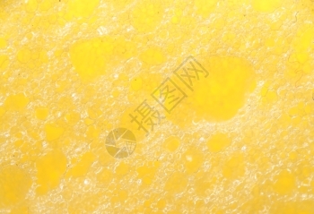 泡沫无缝纹理黄海绵宏观图片