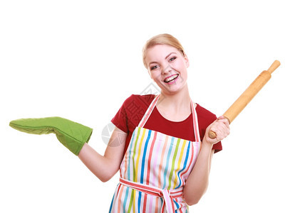 快乐家庭主妇或身着厨房围裙的面包师主厨绿烤炉手持烘滚针空的复制间用白隔开的手掌伸和白隔展示图片