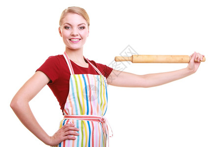 快乐家庭主妇或穿着厨房围裙的面包师厨穿着房围裙的快乐家庭主妇或面包师厨持有烘烤滚针为白纸上孤立的文本食谱制片室图作框架复空间背景图片